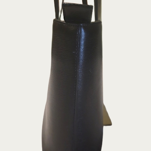 DKNY Bryant Medium Zippered Tote Bag in black leather with gold-tone hardware.  - Picture 4 of 17